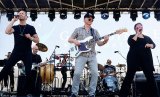 Actor and musician Gary Sinise plays with his band at NAS Lemoore.